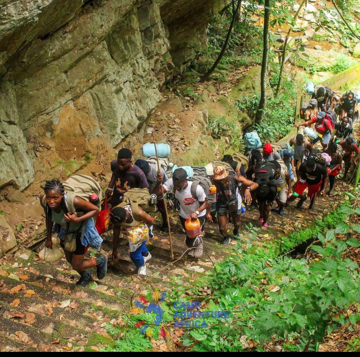 Hikers ascending Erin-Ijesha waterfalls